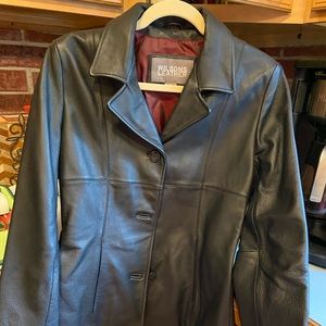 Black Wilson leather jacket. Like new. Size small.